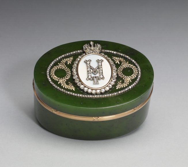 Oval box with monogram of Tsar Nicholas II, Peter Carl Fabergé (Russian, 1846-1920); Henrik Emanuel Wigström, workmaster (Finnish, 1862-1923), St. Petersburg, early 20th century, Nephrite, gold (56 zolotnik [14 karat]), diamonds, enamel, 1 ¾ x 3 ½ x 2 ⅝ in. (4.4 x 9 x 6.7 cm), Provenance: Alexandre Polovtsoff; Henry Walters, ca. 1929-30; The Walters Art Museum, 1931, by bequest, 57.1047. Cat. no. 51, © The Walters Art Museum. Photography by Susan Tobin. Courtesy Thames & Hudson.