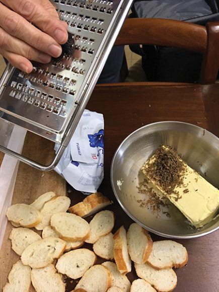 Shaving truffles to make truffle butter – yum! 