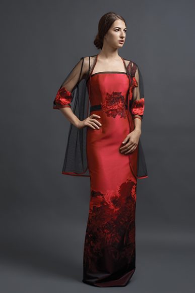 A “Jardin Anglaise” jacquard slim strapless gown with appliquéd waist medallion and appliquéd tulle jacket, both with Swarovski crystal detailing, $4,400. Photograph by Roman Makhmutov.