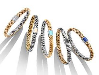 The Reversible Classic Chain bracelet can be personalized with 21 different stones.
