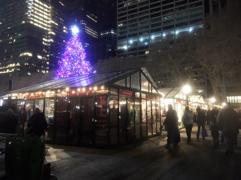 A look at some at some of Bryant Park’s holiday shops, with the striking tree as a backdrop. Photograph by Danielle Renda.
