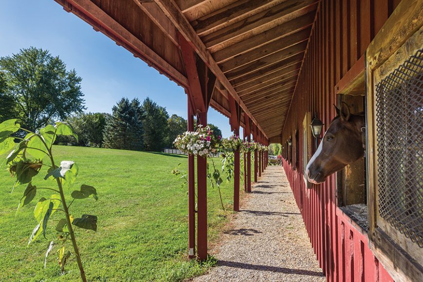 The equestrian facilities and Greek Revival house at Autumn Farms in North Salem. Courtesy William Pitt/Julia B. Fee Sotheby’s International Realty.