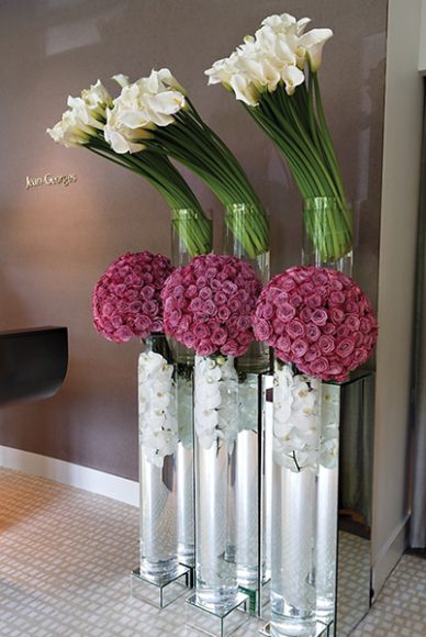 Calla lilies, cool water roses and phalaenopsis orchids stand at attention at Nougatine at Jean-Georges in Manhattan for Deborah Simon’s birthday. Courtesy KC Creations.