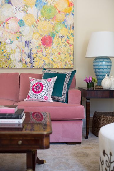 A traditional Georgian home reflecting feminine flair goes bold with a pink sofa. Courtesy Amy Aidinis Hirsch.