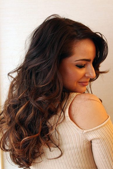 A voluminous hairstyle by stylist Ric Pipino. Photograph by Dan Viteri.