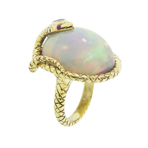 Ring set in 18k yellow gold with ruby, diamond and opal. Photograph courtesy Silvia Furmanovich.