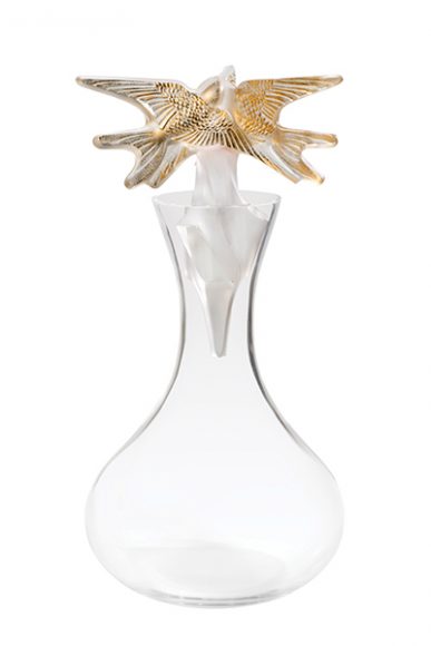 The Hirondelles carafe, a clear and gold stamped decanter, 2018 Vintage edition, from Lalique. Image courtesy Lalique.