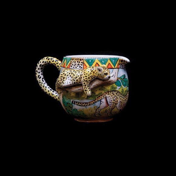 A cup for storing creamer. Photograph by Howard Zoubek.