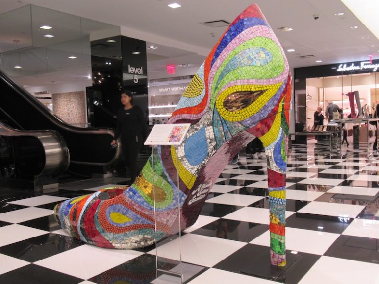 An oversize shoe created by mosaic artist Allison Eden offers a vivid introduction to the newly renovated floor devoted to shoes at Bloomingdale’s 59th Street in Manhattan. Photograph by Mary Shustack.