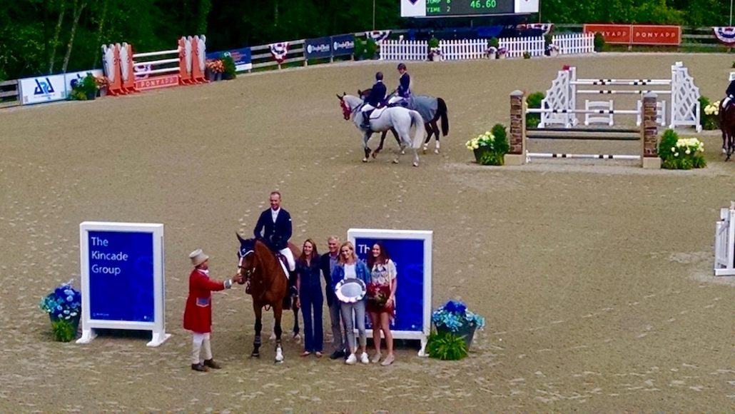 Beat Mändli, who won the $130,000 Empire State Grand Prix at Old Salem Farm’s Spring Horse Shows Sunday, at the trophy presentation. Photographs by Robin Costello.