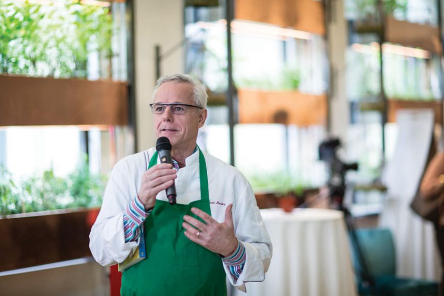 Chef David Bouley speaking at a “The Chef and the Doctor” dinner series program.
