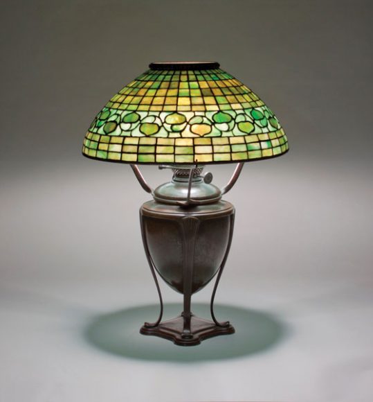 Tiffany Studios Vine-border reading lamp, c. 1905, Favrile glass, bronze, 22 x 18 in. Lillian Nassau, LLC