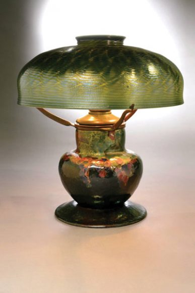 Tiffany Studios Enameled table lamp, after 1902, Favrile glass, enameled bronze, 22 x 16 in. Richard H. Driehaus Collection, Chicago, IL. Photo courtesy of Michaan’s Auctions. 