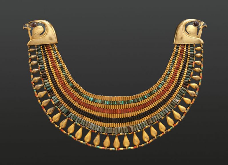 Broad collar of Senebtisi, Middle Kingdom, Dynasty 12, late-early 13 (ca. 1850-1775 B.C.). From Egypt, Memphite Region, Lisht North, Tomb of Senwosret (758), Pit 763, burial of Senebtisi, MMA excavations, 1906-07. Faience, gold, carnelian, turquoise. Falcon heads and leaf pendants originally gilded plaster, restored in gilded silver. Eyes originally gilded beads restored in gilded plaster. Outside diam. 25 cm (9 13/16 in); max w. 7.5 cm (2 15/16 in). The Metropolitan Museum of Art, Rogers Fund, 1908 (08.200.30).