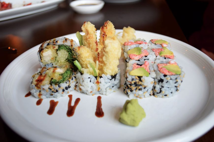 A California roll and a chicken tempura roll.