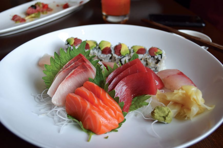 A sushi and sashimi platter.