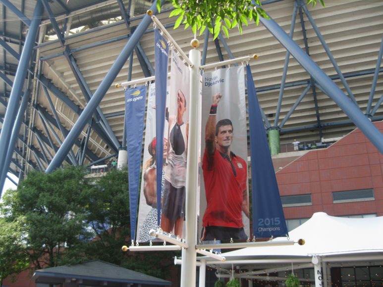 A banner for 2015 champ Novak Djokovic. Photos by author.