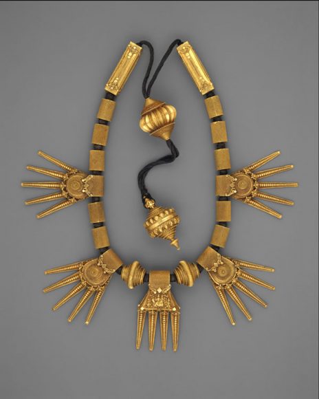 Marriage Necklace (Thali), late 19th century, India (Tamil Nadu, Chetiar), Gold strung on black thread, Bottom of central bead to end of counterweight: L. 33 1/4 in. (84.5 cm). The Metropolitan Museum of Art, Gift of Cynthia Hazen Polsky, 1991 (1991.32.3).