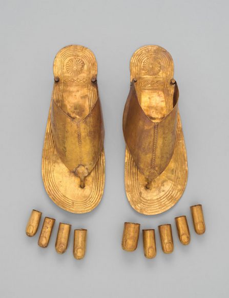 Gold Sandals and Toe Stalls, New Kingdom, Dynasty 18, reign of Thutmose III, ca. 1479-1425 B.C., From Egypt, Upper Egypt, Thebes, Wadi Gabbanat el-Qurud, Wadi D, Tomb of the 3 Foreign Wives of Thutmose III, Gold sandals: L. 26.4 cm (10 3/8 in.); W. 10 cm. (3 15/16 in.); W. at heel 7 cm. (2 3/4 in.); toe stalls: various The Metropolitan Museum of Art, Fletcher Fund, 1922 (26.8.148a, b), and Fletcher Fund, 1921–22 (26.8.185-189, .193–194, .198–199).