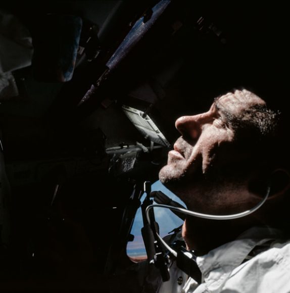 © APOLLO VII-XVII, to be published by teNeues in September 2018, € 50, www.teneues.com, Apollo 7, Walt looking out of the Command Module window during their 11-day orbit around the Earth. (AS07-04-1584), Photo © courtesy of The National Aeronautics and Space Administration (NASA) photographic archives