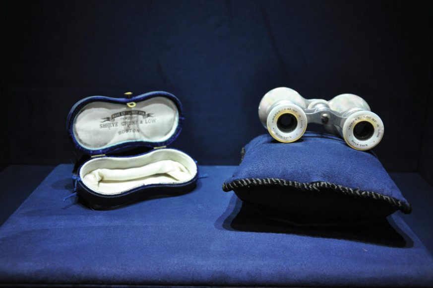 A pair of elegant binoculars with mother of pearl detailing etched with “Shreve, Crump & Low, Boston.” Photograph by Meghan McSharry.