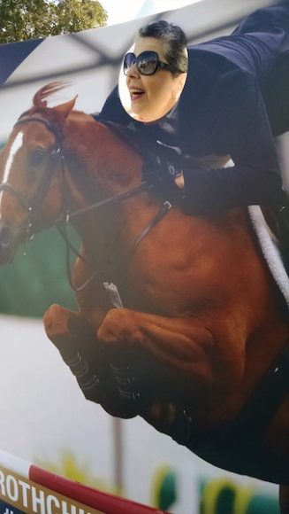 Fans like WAG editor in chief Georgette Gouveia took photos with a cutout of McLain Ward’s retiring faithful steed, Rothchild. Photograph by Robin Costello