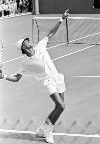 Arthur Ashe serves to Orlando Bracamonte of Venezuela during a Davis Cup match, Cherry Hills Country Club, Denver, Colorado, Sept. 15, 1963. AP Images. All photographs courtesy Raymond Arsenault’s “Arthur Ashe: A Life” (Simon & Schuster).