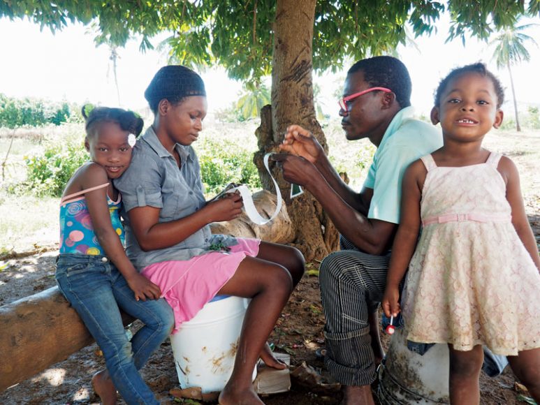 Stitchers for Good Threads, a philanthropic effort based in Haiti, earn up to five times the average wage for the area, allowing them to create a stable home life. Courtesy Good Threads.