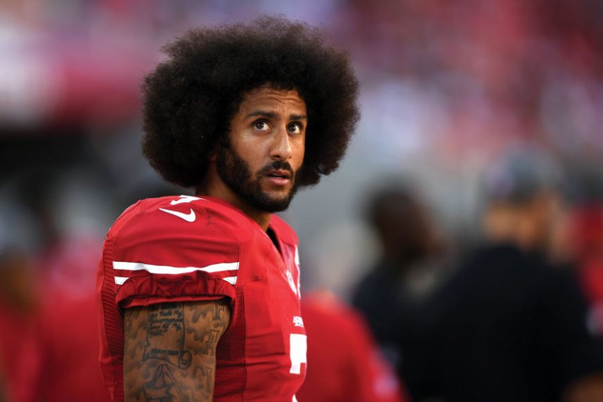 Colin Kaepernick of the San Francisco 49ers looks on from the sidelines during the team's NFL game against the Tampa Bay Buccaneers on Oct. 23, 2016. Thearon W. Henderson/Getty Images.