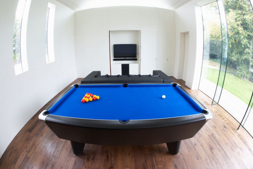 A man cave can be designed to suit any man, with accents from a pool table to a flat screen TV. 