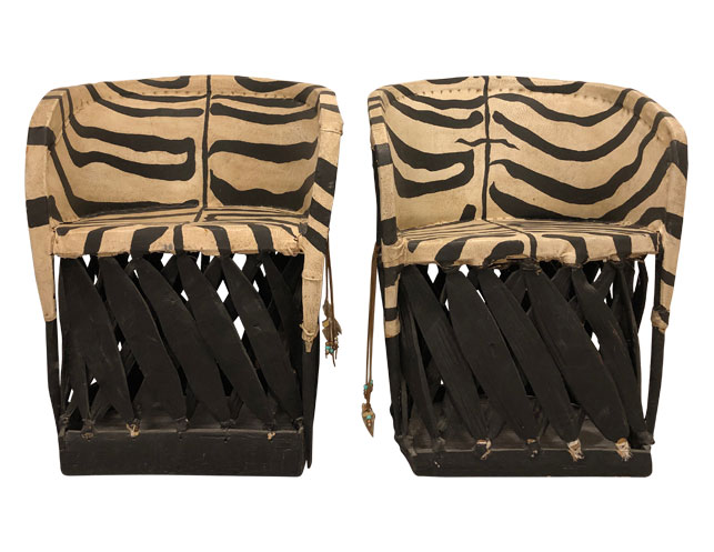 Pair of zebra stenciled Equipale barrel chairs available on The Local Vault. Named after a throne-like seat used by Aztec rulers, these traditional Mexican chairs are suitable for indoor or outdoor use. $1,800. 