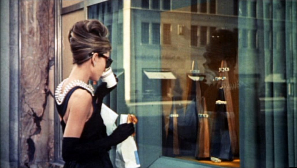 Audrey Hepburn in the iconic opening of “Breakfast at Tiffany’s” (1961).