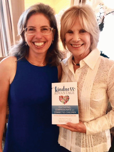 Amanda Salzhauer and her aunt, Dale Atkins, with their book, “The Kindness Advantage: Cultivating Compassionate and Connected Children.” Courtesy Dale Atkins.
