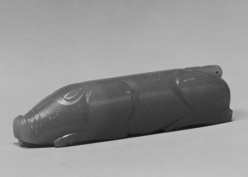 “Pig in Recumbent Position,” China, Eastern Han dynasty (25–220), 1st–2nd century, Jade (nephrite), H. 1 1/8 in. (2.9 cm); L. 4 1/2 in. (11.4 cm), Charlotte C. and John C. Weber Collection, Gift of Charlotte C. and John C. Weber, 1994. 1994.605.96. Courtesy The Metropolitan Museum of Art.