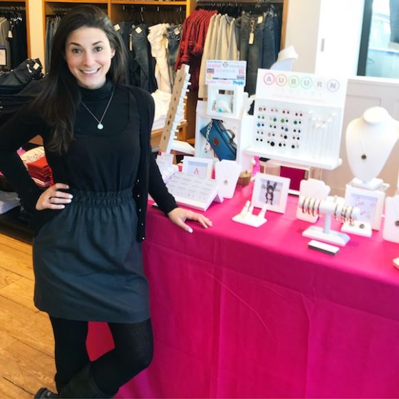 Samantha Levine, founder and creative director of Auburn Jewelry, showcasing her designs at a recent J.Crew pop-up appearance. Courtesy Auburn Jewelry.