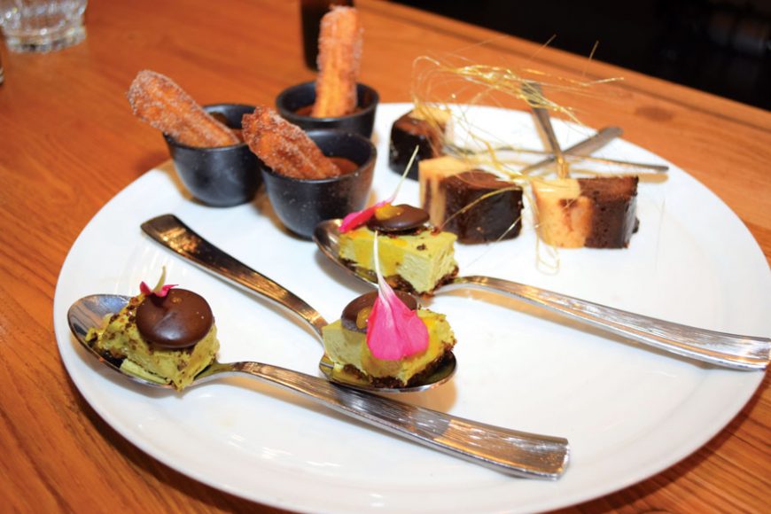 An avocado cream dessert, churros and chocolate flan.