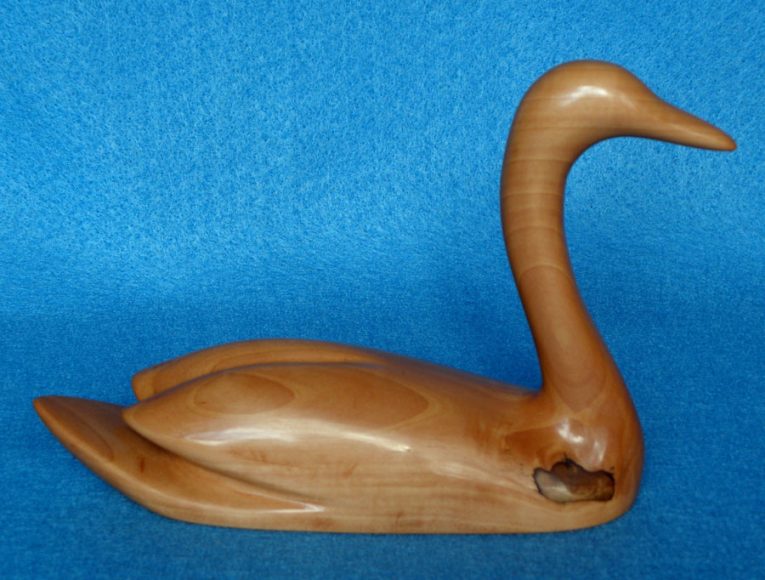 Robert Lagasse, Swan, Hand Carved Cherry. 8” x 3” x 6.” Courtesy J. Russell Jinishian Gallery.