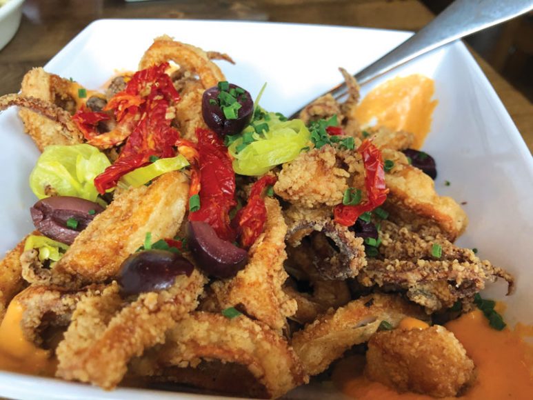Crispy calamari with sundried tomatoes and peppers. Photograph by Aleesia Forni.
