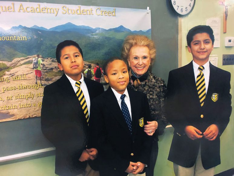 Students Brandon Miller, from left, Sa’heed Dabbs with Ann T. Mara and fellow student Daniel Ruiz at San Miguel Academy of Newburgh in November 2014. Photograph by Simon Feldman.