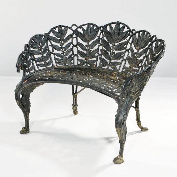 Painted cast iron "Laurel Pattern" bench (late 19th century), attributed to Coalbrookdale Iron Foundry, England. Sold at Skinner Inc. for $3,690. Courtesy Skinner Inc.