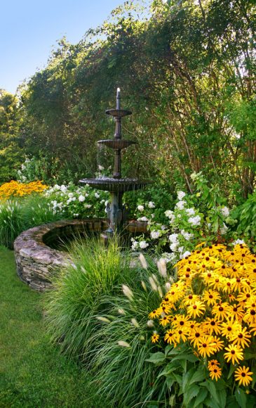 This scene, as described in “Bloom: The Luminous Gardens of Frederico Azevedo” (Pointed Leaf Press) by the designer himself: “This antique bronze fountain that we bought in Vermont was such a great find that I designed a small stone pool as its base. The three tiers bring movement and sound to the surrounding gardens, and the stone addition acts as a reflecting pool for the flowers.” Photographs, above and book cover, by Frederico Azevedo. Courtesy Pointed Leaf Press.