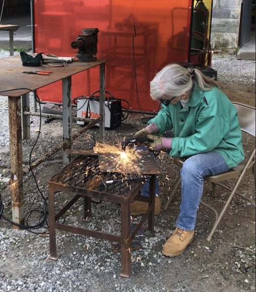 Artist Karen Madden at work. Courtesy ARTmostNY Open Studio Tour.