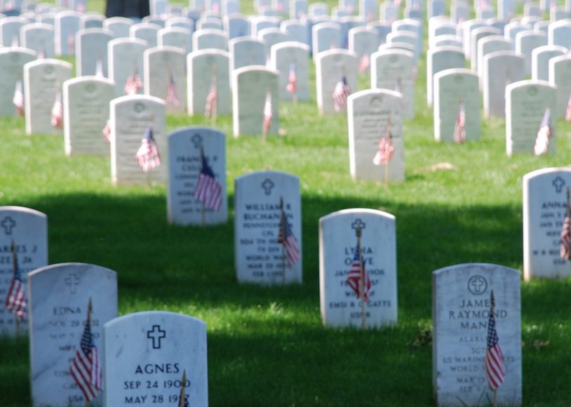 Flags decorate graves in Arlington National Cemetery on Memorial Day, 2008.