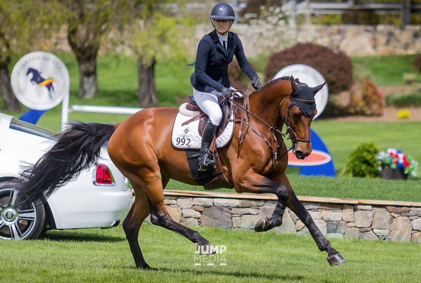 Olympic silver medalist and Old Salem Farm trainer Lucy Davis aboard Caracho 14 at the Spring Horse Shows. Photograph by Jump Media.