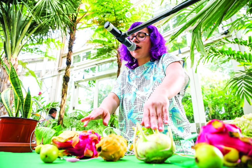 Angélica Negrón “playing” assorted vegetables at the New York Botanical Garden. Photograph by Ben Hider. Courtesy NYBG.