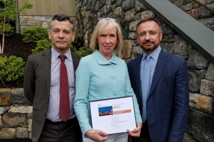 John Wasilewski of David Scott Parker Architects, from left; Debra Mecky, the executive director and CEO of the Greenwich Historical Society; and David Scott Parker showcase the SARA Award for Professional Design Excellence. Courtesy Greenwich Historical Society.