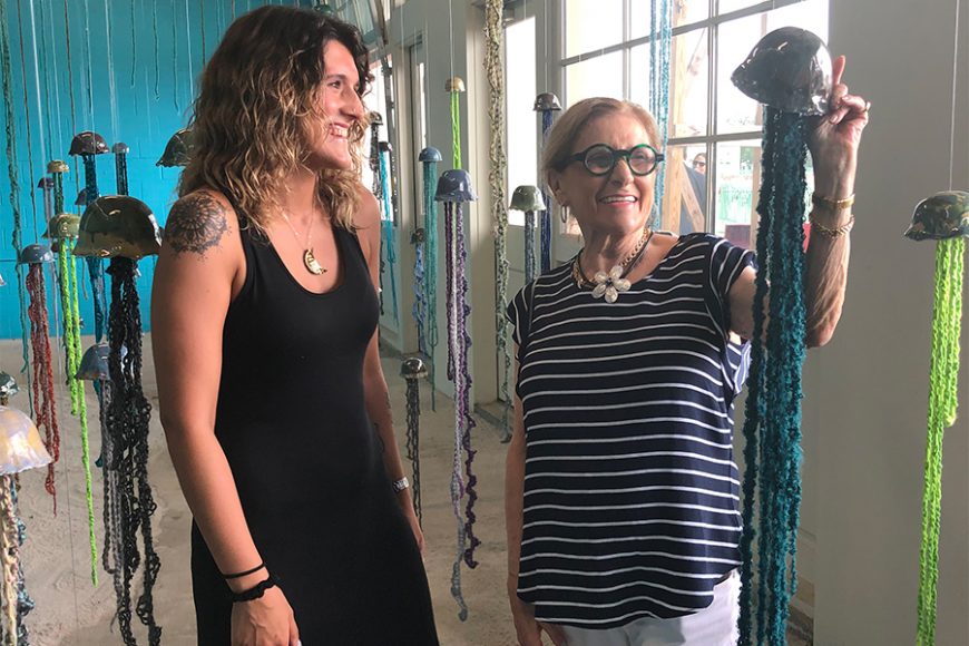 Yonkers ceramicist Tatjana Kunst and ArtsWestchester CEO Janet T. Langsam admire Kunst’s colorful, imaginative “Floating Forest,” the winning entry in the “Art on the Beach” project. Photograph by Aleesia Forni for Thompson & Bender.