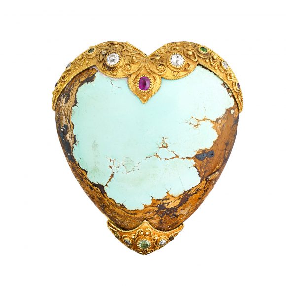 Heart-shaped turquoise brooch, unusual for incorporating its matrix in a gem-set gold frame (late 19th century), sold for $1,750. Courtesy Rago Auctions.