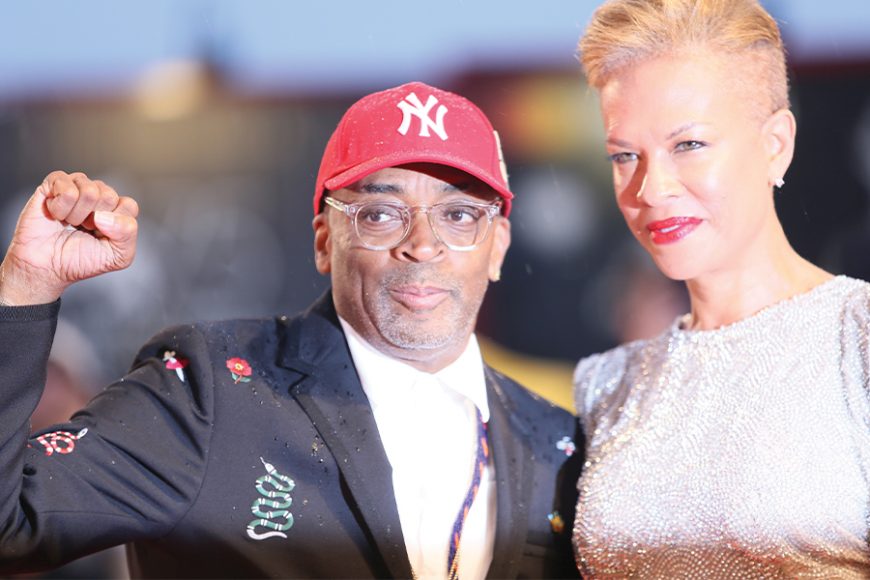 Spike Lee, in his bespoke red New York Yankees cap, and Tonya Lewis Lee at the “A Star Is Born” screening during the 75th Venice Film Festival last year. He’s credited with taking the Yankee cap beyond baseball.