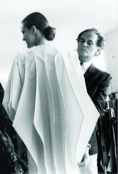 Pierre Cardin developing his "Computer" coat, 1980. Photograph courtesy of Archives Pierre Cardin. © Archives Pierre Cardin.